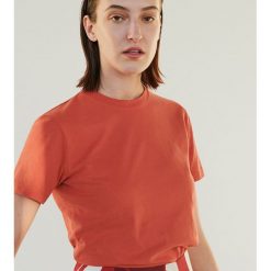 T-shirt z bawełny organicznej - Czerwony. Czerwone t-shirty damskie Reserved, s, bez wzorów, z bawełny, bez kołnierzyka. W wyprzedaży za 14,99 zł.