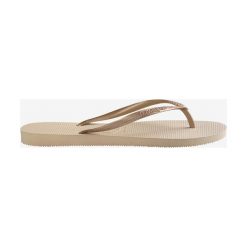Havaianas Slim Japonki Brązowy Beżowy. Pomarańczowe klapki damskie Havaianas, w paski, z materiału, bez obcasa. Za 119,95 zł.