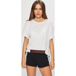 Calvin Klein Jeans - Top plażowy. Białe stroje kąpielowe damskie Calvin Klein Jeans, s, bez wzorów, z elastanu. W wyprzedaży za 99,90 zł.