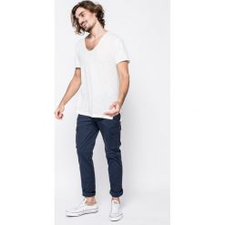 Hilfiger Denim - Spodnie. Zielone spodnie męskie marki Hilfiger Denim, na co dzień, bez wzorów, z elastanu, casualowe. W wyprzedaży za 269,90 zł.
