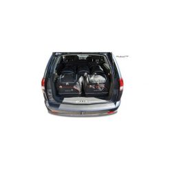 OPEL VECTRA KOMBI, 2002-2008 TORBY DO BAGAŻNIKA 5 SZT KJUST - 7031018. Torby podróżne KJUST, bez wzorów, z kauczuku, klasyczne. Za 1379,00 zł.