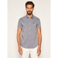 Koszula Emporio Armani 8N1C10 1N06Z F916. Niebieskie koszule męskie Emporio Armani, m, bez wzorów, z elastanu, casualowe, bez kołnierzyka, bez rękawów. W wyprzedaży za 449,00 zł.