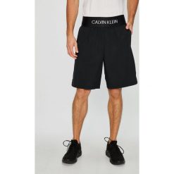 Calvin Klein Performance - Szorty. Szare spodenki sportowe męskie Calvin Klein Performance, z materiału, sportowe. Za 219,90 zł.