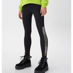 Legginsy z nadrukiem - Czarny. Czarne legginsy damskie House, s, z nadrukiem. Za 69,99 zł.