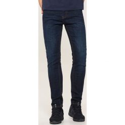 Jeansy skinny - Niebieski. Niebieskie jeansy męskie skinny House. Za 99,99 zł.