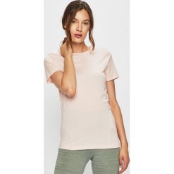 Nike - T-shirt. Różowe t-shirty damskie Nike, s, bez wzorów, z elastanu, z okrągłym kołnierzem. W wyprzedaży za 89,90 zł.