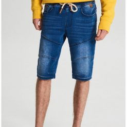 Szorty jogger z przeszyciami - Niebieski. Niebieskie spodenki i szorty męskie Cropp, m, bez wzorów. Za 119,99 zł.