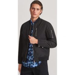 Kurtka typu bomber - Czarny. Czarne kurtki męskie Reserved, s, bez wzorów, bez kaptura. Za 169,99 zł.