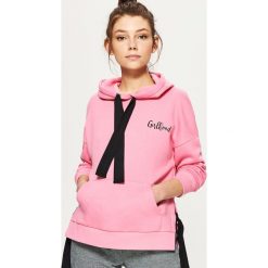Bluzy damskie: Bluza z taśmami - Różowy
