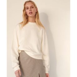 Bluza z bawełny organicznej - Kremowy. Białe bluzy damskie Reserved, s, bez wzorów, z bawełny, bez kołnierzyka, bez rękawów, bez kaptura. W wyprzedaży za 89,99 zł.