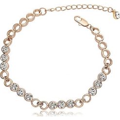 Pozłacana bransoletka z kryształkami Swarovski. Żółte bransoletki damskie Metropolitan, Smithfield, Crystal Deluxe & Co., z materiału, z kryształem, złote. W wyprzedaży za 34,95 zł.