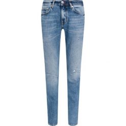 Jeansy Regular Fit TOMMY HILFIGER MW0MW10874. Niebieskie jeansy męskie TOMMY HILFIGER, m, bez wzorów, z elastanu. W wyprzedaży za 279,00 zł.
