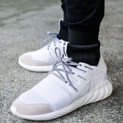 Buty adidas Tubular Doom "White" (BA7554). Białe halówki męskie marki Nike, z syntetyku, do piłki nożnej. Za 249,99 zł.