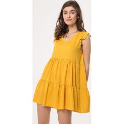 Żółta Sukienka Ambiguity. Żółte sukienki damskie Born2be, s, z aplikacjami, eleganckie, krótkie, mini, trapezowe. Za 69,99 zł.