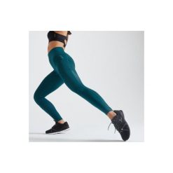 Legginsy fitness kardio damskie 500 niebieskie. Niebieskie legginsy sportowe damskie DOMYOS, xl, w paski, z elastanu, na fitness i siłownię. Za 79,99 zł.