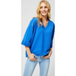 Bluza typu oversize. Niebieskie bluzy damskie Moodo, s, bez wzorów, z bawełny, bez rękawów, bez kaptura. Za 34,99 zł.