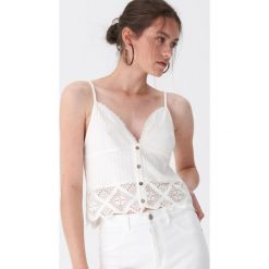 Dzianinowy top - Biały. Białe bluzki damskie House, s, bez wzorów, z dzianiny, bez kołnierzyka. Za 49,99 zł.