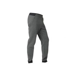Spodnie dresowe Gym & Pilates 540 męskie. Czarne spodnie męskie DOMYOS, s, bez wzorów, z elastanu. Za 99,99 zł.