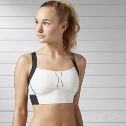Stanik Reebok Running Compression Czarno-Biały. Czarne biustonosze sportowe damskie Reebok, bez wzorów. Za 159,99 zł.