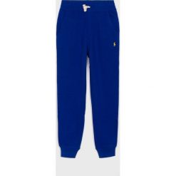 Polo Ralph Lauren - Spodnie dziecięce 134-176 cm. Niebieskie spodnie chłopięce Polo Ralph Lauren, bez wzorów, z bawełny. W wyprzedaży za 179,90 zł.