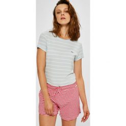 Lacoste - Top. Niebieskie bluzki damskie Lacoste, l, bez wzorów, z elastanu, casualowe, z okrągłym kołnierzem, z krótkim rękawem. W wyprzedaży za 179,90 zł.