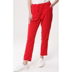 Czerwone Spodnie Wish Fulfilment. Czerwone spodnie damskie Born2be, s, bez wzorów, z tkaniny. Za 49,99 zł.