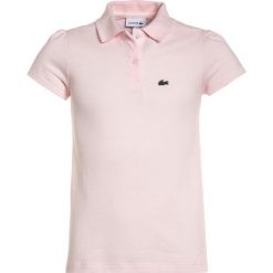 Lacoste Koszulka polo rose. Różowe t-shirty damskie Lacoste, z bawełny, polo. Za 219,00 zł.