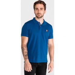 Tommy Hilfiger Polo Koszulka Niebieski. Niebieskie koszulki męskie TOMMY HILFIGER, s, bez wzorów, z bawełny, polo, bez rękawów. Za 430,95 zł.