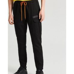 Spodnie slim jogger - Czarny. Czarne spodnie męskie Cropp, m, bez wzorów. Za 119,99 zł.