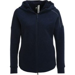Adidas Performance Z.N.E. TRAVEL Bluza rozpinana storm heather/coll navy. Niebieskie bluzy rozpinane damskie marki adidas Performance, s, z bawełny. W wyprzedaży za 471,20 zł.