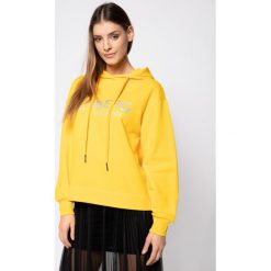 Bluza Iceberg E0416302. Żółte bluzy damskie Iceberg, bez wzorów, z bawełny, bez rękawów, bez kaptura. W wyprzedaży za 559,00 zł.