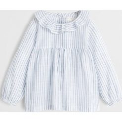 Mango Kids - Koszula dziecięca Lili 80-104 cm. Białe bluzki dziewczęce Mango Kids, bez wzorów, z bawełny, z okrągłym kołnierzem, z długim rękawem, długie, bez kaptura. Za 69,90 zł.