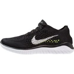 Nike Performance FREE RN FLYKNIT 2018 Obuwie do biegania neutralne black/white. Czarne buty do biegania damskie Nike Performance, z materiału. Za 549,00 zł.