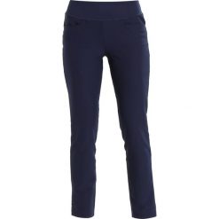 Puma Golf PULL ON PANT Spodnie materiałowe peacoat. Niebieskie bryczesy damskie Puma Golf, xs, z elastanu, na golfa. Za 359,00 zł.
