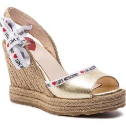 Espadryle LOVE MOSCHINO - JA1633AI07JC0900 Platino. Żółte espadryle damskie Love Moschino, bez wzorów, ze skóry, bez obcasa, na obcasie. W wyprzedaży za 519,00 zł.