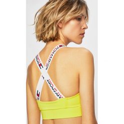 Tommy Sport - Biustonosz. Niebieskie biustonosze sportowe damskie Tommy Sport, s, bez wzorów, z elastanu. W wyprzedaży za 159,90 zł.