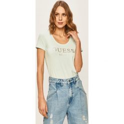 Guess Jeans - T-shirt. Czerwone bluzki damskie Guess Jeans, s, z nadrukiem, z elastanu, casualowe, z okrągłym kołnierzem. Za 149,90 zł.