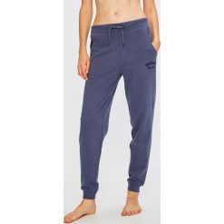 Tommy Hilfiger - Spodnie piżamowe. Niebieskie piżamy damskie marki TOMMY HILFIGER, m, z bawełny. W wyprzedaży za 219,90 zł.