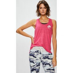 Nike Sportswear - Top. Różowe topy sportowe damskie marki Nike Sportswear, s, z bawełny, z okrągłym kołnierzem. W wyprzedaży za 89,90 zł.