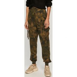 Desigual - Spodnie. Niebieskie spodnie damskie Desigual, s, bez wzorów, z lyocellu, z podwyższonym stanem. Za 399,90 zł.