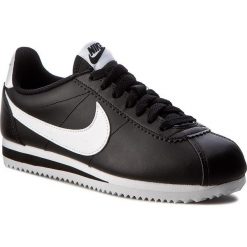 Buty NIKE - Classic Cortez Leather 807471 010 Black/White/White. Czarne buty sportowe damskie Nike, bez wzorów, ze skóry, bez obcasa, na płaskiej podeszwie, bez zapięcia. W wyprzedaży za 319,00 zł.
