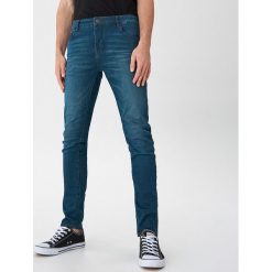 Jeansy slim fit - Zielony. Zielone jeansy męskie House, m, bez wzorów. Za 129,99 zł.