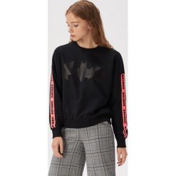 Bluza z nadrukiem Batman - Czarny. Czarne bluzy damskie Sinsay, s, z nadrukiem. Za 59,99 zł.