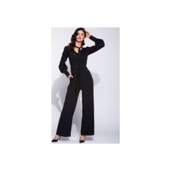 Wizytowy kombinezon damski z szerokimi nogawkami. Czarne kombinezony eleganckie marki Bien fashion, xl, z koronki, z dekoltem na plecach, długie. Za 199,00 zł.