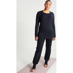 YOGA CURVES Bluzka z długim rękawem midnigh blue. Niebieskie topy sportowe damskie marki YOGA CURVES, z elastanu, sportowe, z długim rękawem. Za 199,00 zł.