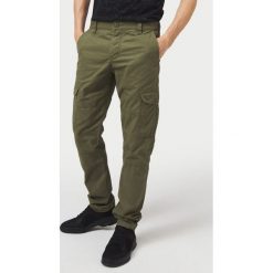 O'Neill Spodnie Zielony. Zielone spodnie męskie O'Neill, bez wzorów, z bawełny. Za 395,95 zł.
