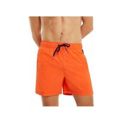 Tommy Hilfiger Plavkové kraťasy Slim Fit Medium Drawstring UM0UM01079 -885 Pikantny Orange (rozmiar M). Pomarańczowe kąpielówki męskie TOMMY HILFIGER, m, bez wzorów. W wyprzedaży za 152,00 zł.