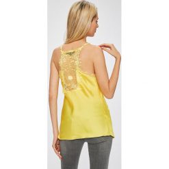 Answear - Top. Żółte bluzki damskie marki ANSWEAR, s, bez wzorów, z poliesteru, casualowe, bez kołnierzyka, bez rękawów. W wyprzedaży za 49,90 zł.