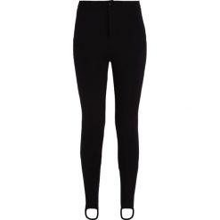 Calvin Klein Jeans HIGH RISE STIRRUP Legginsy black. Czarne jegginsy damskie Calvin Klein Jeans, xs, z elastanu. W wyprzedaży za 349,30 zł.