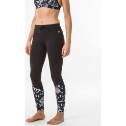 Legginsy UV surfing 500 AKARU damskie. Czarne topy damskie OLAIAN, xl, bez wzorów, z elastanu, bez rękawów. Za 79,99 zł.